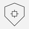Shield with chip core — protected firmware vault, monochrome line art